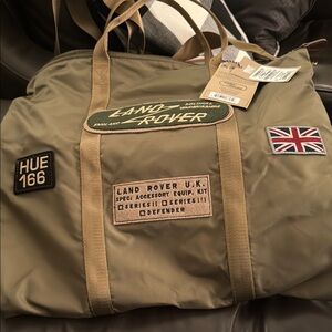 Green Duffel Bag with Rugged Canvas and Military Aesthetic